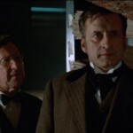 Jack Gilford, George C. Scott: Dank etwas Pomade im Schopf trotzt die Frise selbst Backstein.