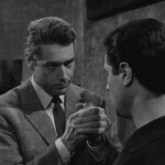 Kervin Mathews und Henri-Jacques Huet spielen mit Nüssen