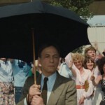 Regenschirm gegen Vogelkot auf dem teuren Zwirn: Jean Négroni